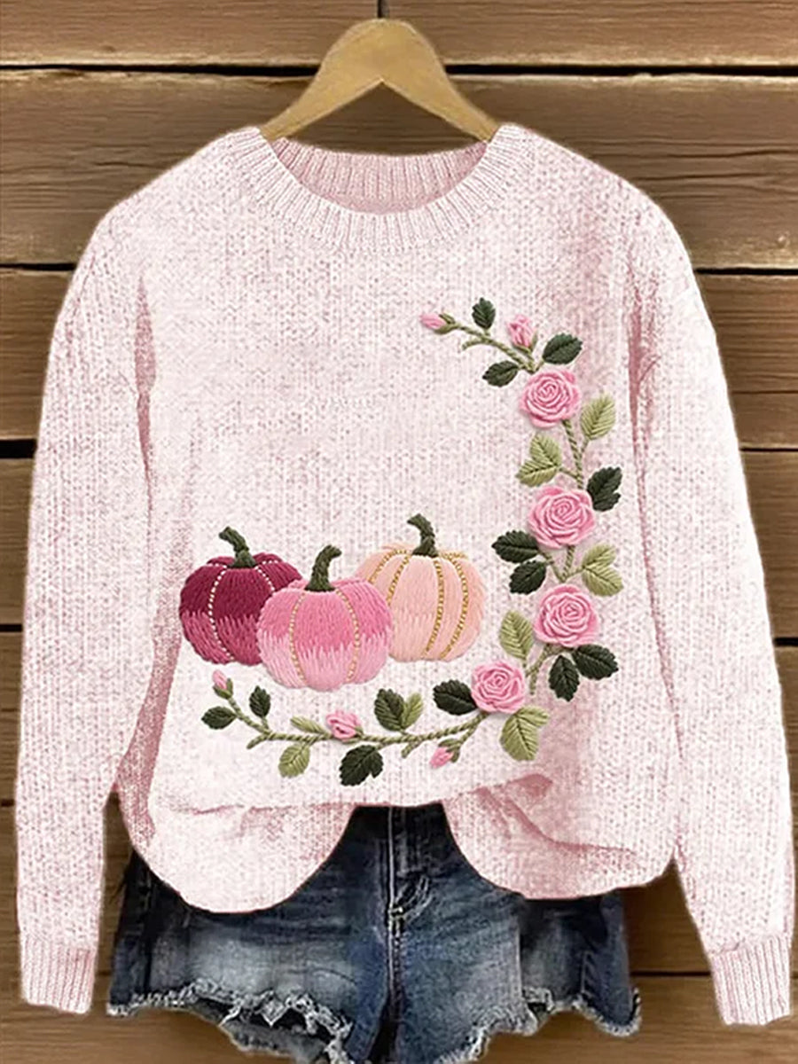 Damski różowy sweter z nadrukiem kwiatowym